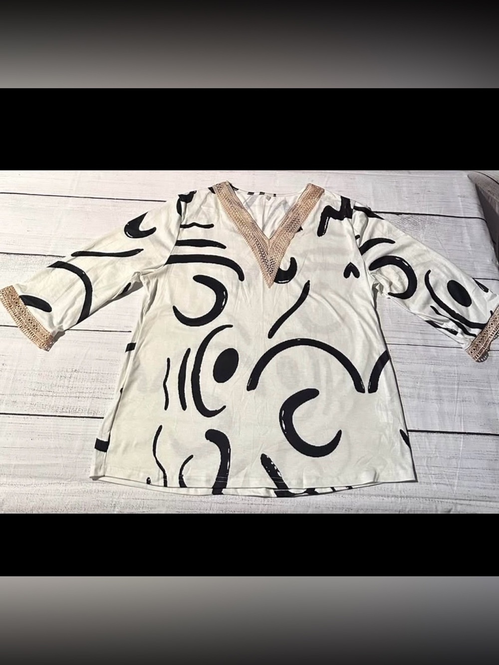 Women’s Cream V-Neck Top with Black Abstract Print